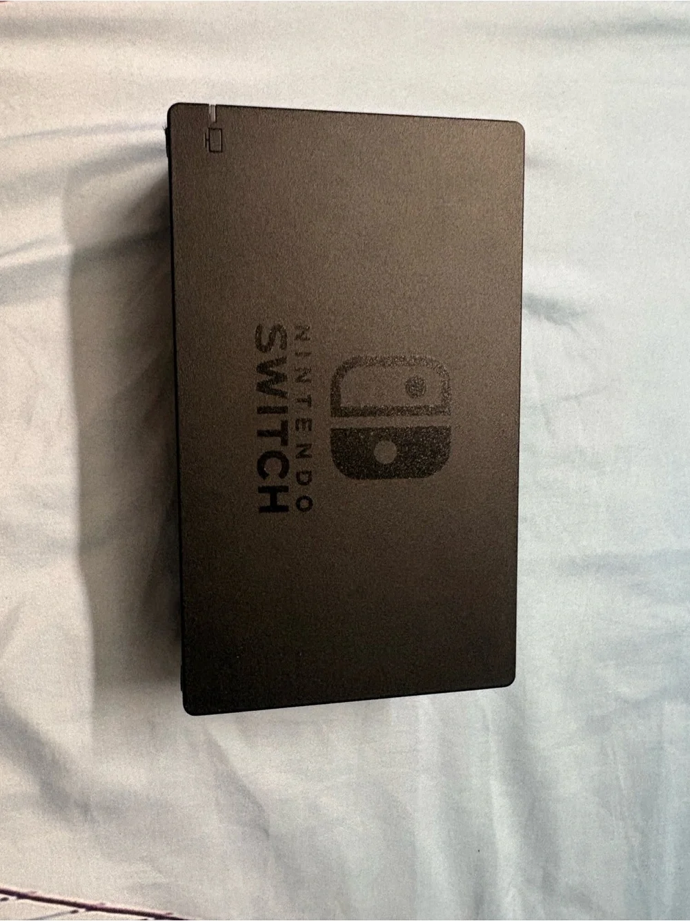 Nintendo Switch with Neon Red Right Joy‑Con and Neon Blue Left Joy‑Con